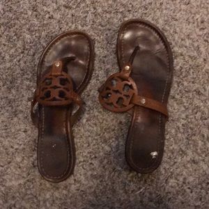 Brown, worn Tory Burch flip flops